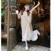Vestido Tricô Francês Vazado de Manga Curta para Mulheres Verão e Outono Fenda Lateral Longa Estilo Colorido de Férias Blusa em Camadas Solta