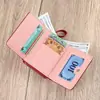 Fornecimento transfronteiriço direto da fábrica Carteira feminina doce estilo coreano, bolsa de mão curta com zíper, porta-moedas e porta-cartões simples de cor sólida