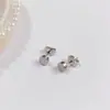 Aretes de Tuerca Geométricos de Estrella de Acero Titanio con Bolas de Acero Grandes y Pequeñas de Moda Simple al por Mayor de Fábrica de Venta Caliente Aretes Perforados Mujeres