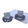 Directo de fábrica rizado blanco y negro anillo para el pelo de intestino grueso cuerda para el pelo banda elástica tienda física tienda de dos dólares Accesorios para el Cabello Al por Mayor
