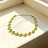Pulseras de flor de acero de titanio con incrustaciones de diamantes, las más vendidas en Europa y América, accesorios de lujo ligero de nicho, cadenas para la clavícula, pulseras de trébol de cuatro hojas, venta al por mayor desde el fabricante