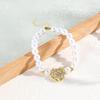 Moda europeia e americana banhado a cobre 18K amor zircônia imitação pérola pulseira joias temperamento charme coração pulseira artesanal