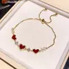 "Corazón de Diamante con Esmalte Rojo" Pulsera Deslizante de Corazón de Circonita Bañada en Oro Real, Pulsera de Gama Alta con Diseño de Nicho