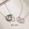 Exquisito Anillo Mobius Explosivo para Pareja de Hombres y Mujeres Collar Personalizado Simple Moda Lujo Ligero Nicho Diseño Joyería