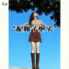 Falda vintage de gamuza estilo francés para mujer, nuevo modelo 2026, de cintura alta, adelgazante, anti-exposición, falda de tubo con línea A A13576