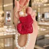 Chaveiro de gato fofo em argila estilo coreano com strass, pingente de bolsa de corrente de pérolas artesanal de alta qualidade, alça de celular