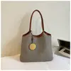 Bolsa de Ombro Retrô Simples Shuai Mi Home para Mulheres Verão 2026 Nova Bolsa de Axila Grande Capacidade Casual para Férias