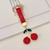 Artículo Popular Transfronterizo: Llavero de Cerámica Arcilla Cereza con Pedrería, Colgante para Llave de Coche, Dijes Brillantes de Cereza con Pedrería para Bolso, Llavero