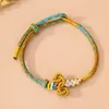 Nuevo Nudo Wenchang Estilo Chino Carpa Koi Nudo Flor de Durazno Pulsera DIY Tejido a Mano Festival Unisex Cuerda Colorida Mayoreo