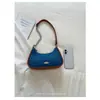 Bolso bandolera para debajo del brazo para mujer 2026 nuevo estilo moderno nicho mezclilla de trabajo de un solo hombro bolso bandolera versátil de moda