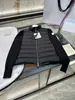 Chaqueta corta de plumón para mujer con mangas de punto y relleno ligero de plumón, cuello alto, abrigo cálido, venta al por mayor de comercio exterior europeo y americano