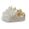 Zapatillas de entrenamiento alemanas de suela blanda para mujer, zapatillas blancas de malla transpirable, nuevo estilo primavera-verano 2026, zapatos casuales versátiles para combinar con pantalones de pierna ancha
