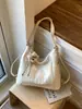 Bolsa de dumplings de gran capacidad para mujer, nuevo diseño de nicho vintage 2026, bolso de hombro cruzado, mochila multifuncional
