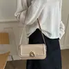 Bolsa texturizada para axila feminina, nova bolsa versátil de ombro e transversal 2026, bolsa baguette nicho para o dia a dia para senhoras