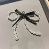 Sapatilhas de balé no mesmo estilo da Jennie com corrente de laço de pérola em formato de coração prateado Fivela de sapato com letra DIY Fecho de flor