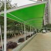 Diseño e instalación de una marquesina de color residencial con estructura de membrana de acero para carga de vehículos eléctricos, cubierta parasol con membrana tensada para exteriores.