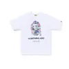 Comercio exterior al por mayor transfronterizo marca de tendencia estilo japonés camuflaje tiburón, cabeza de tigre, hombre-mono bloques de color luminoso manga corta corte holgado camiseta de pareja