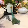 Venta Directa de Fábrica Colgante de Borla de Trébol de Cuatro Hojas Cloisonné Estilo Chino Hanfu Botón a Presión Línea Fina Borla Vertical Accesorio