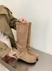 Botas longas de bico redondo, novo estilo de moda 2026, com fivela de cinto, efeito emagrecedor, aumento interno de altura, cano alto empilhado, botas femininas versáteis, estilo coreano, preto