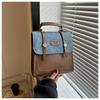 Estilo preppy retro británico 2023 otoño nuevo bolso casual texturizado para estudiante mochila portátil de viaje para mujer
