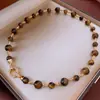 Acero de titanio piedra natural colgante de sol collar de acero inoxidable transfronterizo Maillard temperamento cadena de clavícula joyería nicho al por mayor
