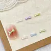 Set mixto de 50 piezas de accesorios para decoración de uñas de lazo, nuevas flores y estrellas tridimensionales de color macarrón, accesorios de resina para uñas postizas