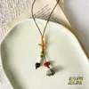 Collar colgante estilo étnico bohemio para mujer, nuevo modelo 2026, diseño de nicho al por mayor, accesorio largo estilo chino nuevo