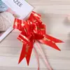49 flores de tirón suministros para celebración de bodas cinta de lazo caja de regalo de boda empaque decoración de coche de boda tirador de manija de puerta flores de tirón al por mayor