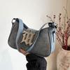 Bolsa de axilas de bastão francês fosco de alta qualidade para mulheres 2024 Transfronteiriço Nova Chegada Portátil Nicho Francês Elegante Ombro Crossbody Bolsa