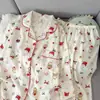 Estampado integral de conejito con borde rojo estampado integral de dibujos animados conjunto de pijama de manga larga y pantalón largo ropa de casa de alto valor primavera y otoño