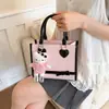 Bolso de mujer 2026 nuevo modelo bolso de mano estilo coreano bolso de hombro mochila de moda bolso cruzado pequeño cuadrado para el día a día