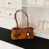 Bolsa de ombro de alta qualidade para o dia a dia, modelo 2026, bolsa de ombro exclusiva de nicho, bolsa de braço estilosa vintage