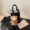 Venta Caliente Transfronteriza Estampado de Leopardo Oso Pequeño Bolso Cruzado para Mujer 2026 Nuevo Dulce Fresco Versátil Bolso de Mano Lindo Mini Bolsita para Teléfono
