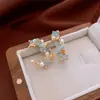 Pendientes de Flor de Gota de Aceite en Forma de C Retro Francés Aguja de Plata Pendientes de Botón de Lujo Ligero Gama Alta Diseño de Moda Pendientes de Nicho