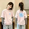 Tops de Primavera y Otoño para Niñas 2026 Nuevo Otoño Camiseta de Manga Larga Rayada de Algodón Puro Camiseta Básica Estilosa de Dibujos Animados ins