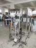 Máquina Dosadora, Máquina de Embalagem, Máquina de Pesagem e Enchimento Automática Completa Multi-Cabeças para Pós Granulados, Grãos, Produtos Secos e Materiais Medicinais