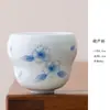 Taza de té de cerámica azul con loto pintado a mano con color de engobe para el hogar taza para degustación de té pu'er juego de té kung fu taza de maestro taza individual
