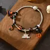 Pulseras de Halloween al por mayor Joyería Transfronteriza Europea y Americana para Mujer Nicho de Gama Alta Minimalista Metal Fantasma Calabaza Pulsera