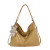 Yue Zi 2026 Outono Inicial Nova Bolsa Elegante Simples de Grande Capacidade para Axila Bolsa de Ombro Único Transversal para o Trabalho Mochila Casual