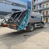 Camión compactador de basura trasero Shaanxi Automobile Delong Placa Amarilla Pequeña de 11 Metros Cúbicos, Vehículo de Transferencia de Basura por Compactación Nacional VI de 12 Metros Cúbicos