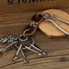 Comercio electrónico transfronterizo suministro llavero retro popular japonés y coreano elegante exquisito llavero de cuero genuino