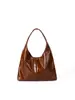Bolsa de Axila de Couro com Cera de Óleo Estilo Coreano de Alta Qualidade para Mulheres 2025 Nova Bolsa de Mão/Ombro Versátil Retro de Nicho para Mulheres