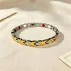 Pulseira de ouro com elos geométricos em corrente cruzada, pulseira de metal simples e de luxo leve, joia feminina de design de nicho