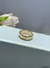 V Oro Versión Alta Recubrimiento Grueso Oro de 18 Quilates Firma de Calidoscopio Anillo de Cuatro Hojas Incrustado con Diamantes Anillo de Dedo de Personalidad a la Moda Venta Directa de Fábrica