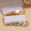 Juego de Doce Piezas de Aretes Redondos Lisos con Forma de C, Estilo Europeo y Americano, con Acabado Metálico, Simples y Elegantes, Aretes de Alta Gama
