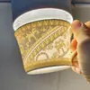 Juego de taza y platillo de café de porcelana de hueso estilo retro europeo, una opción lujosa y elegante para el té de la tarde, perfecto como regalo de inauguración o regalo de negocios