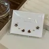 Golpea la cura de Azul ~ 2022 pequeño juego de pendientes de Margarita diseño de nicho pendiente de oreja pendientes estilo Ins para mujer