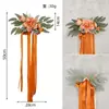 Decoração de cadeira com encosto para evento ao ar livre estilo ocidental Decoração de cadeira com flor flor amarrada flor artificial flor artificial festa de casamento plástico flor de seda