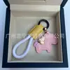 Dinero en el Caballo Cuero de Vaca Creativo Exquisito Casual Regalo de Pareja Bolso Lindo Colgante Llavero de Coche Llavero