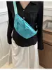 Riñonera de nailon 2026 nuevo estilo bandolera para el pecho bolsa casual de lona para mujer de moda color liso deportiva nicho versátil venta directa